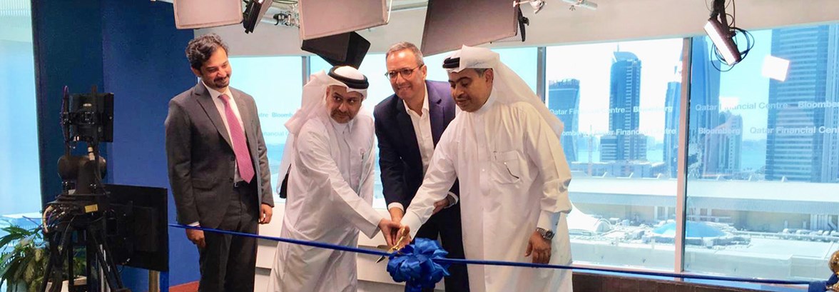 QFC CEO, Minister of Commerce and Industry, and Bloomberg ME cutting the ribbon to launch the first Bloomberg studio in Qatar 